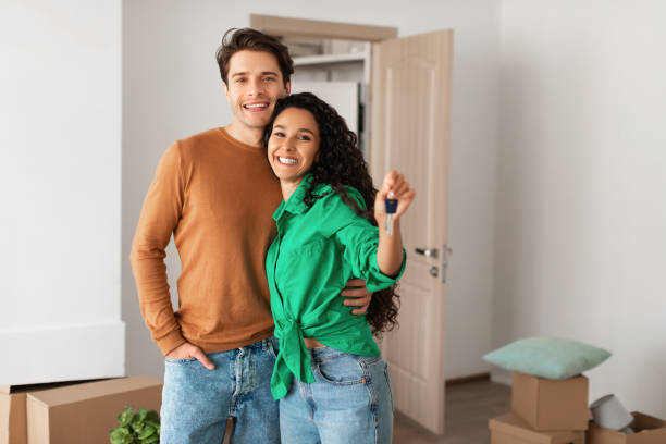 Couple celebrating their new keys
