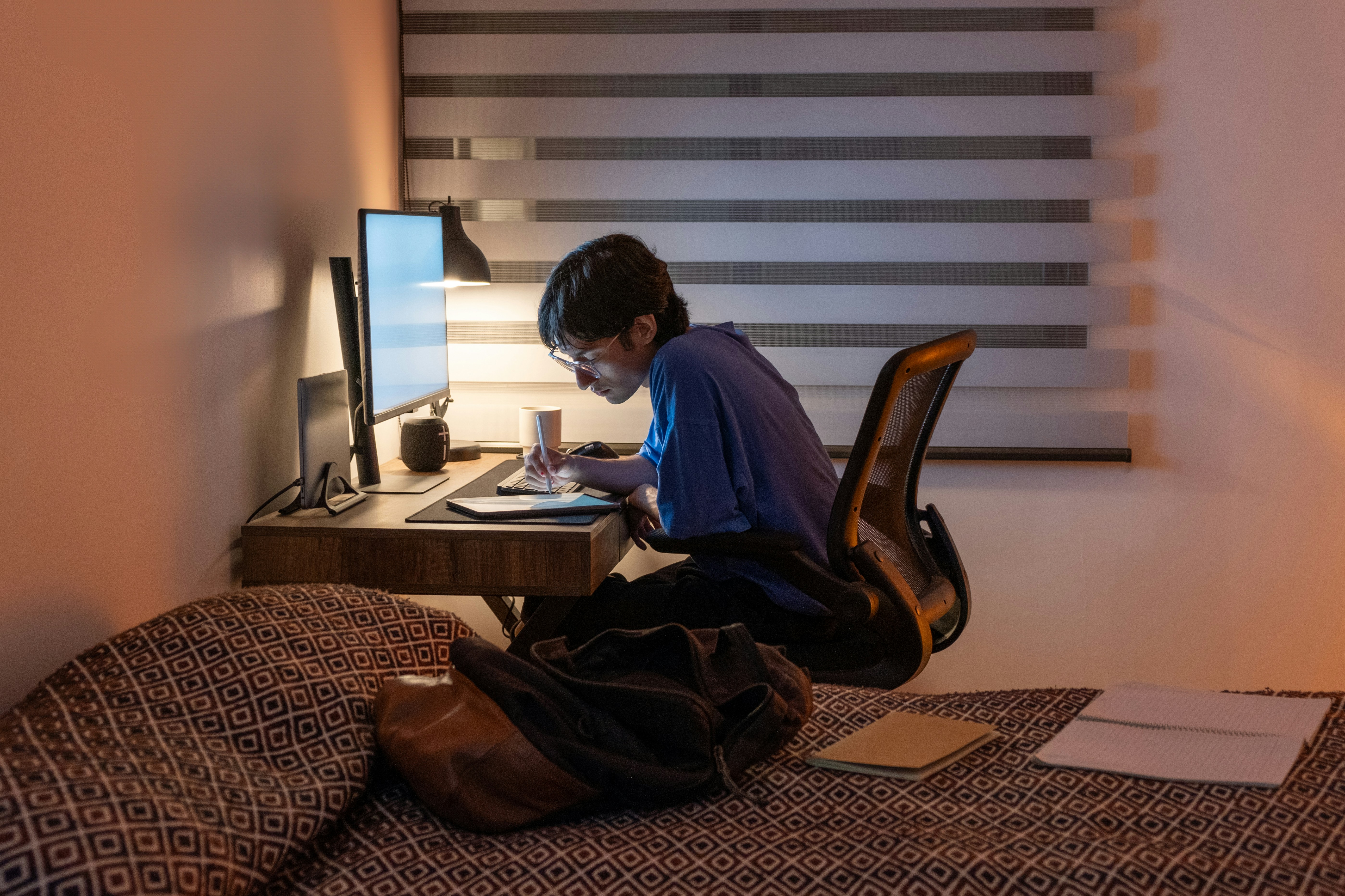 Student reviewing listings late at night